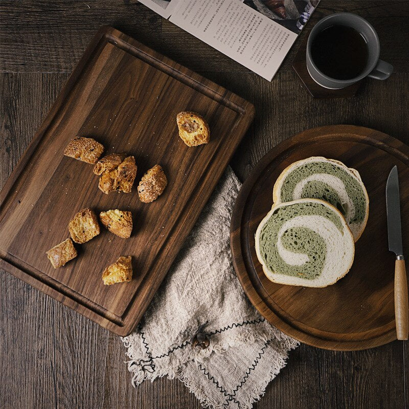 Black walnut round pizza chopping board with handle Solid wood unpainted household wood cutting board Slotted steak plate bread
