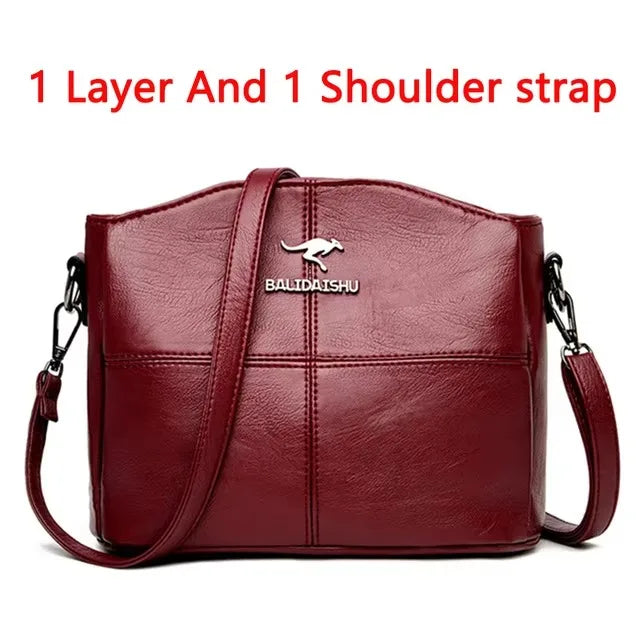 Shoulder strap Red leather crossbody bag image