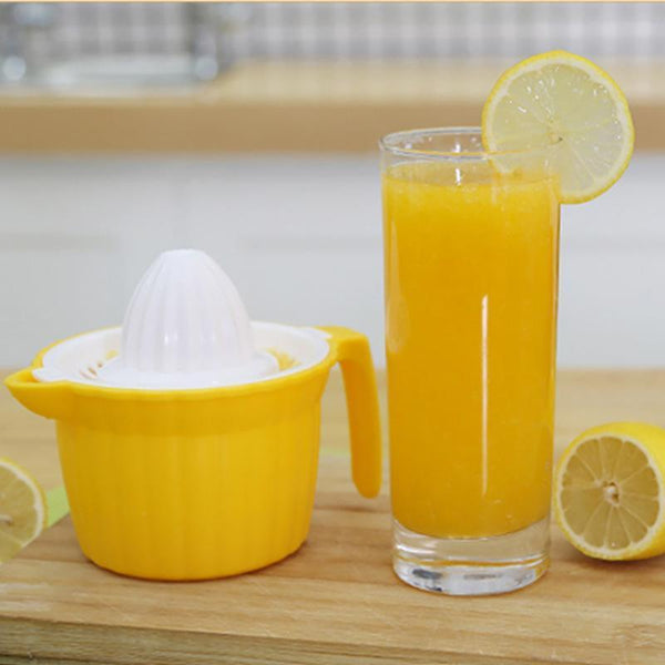 Revitalize mini double-headed manual fruit juicer